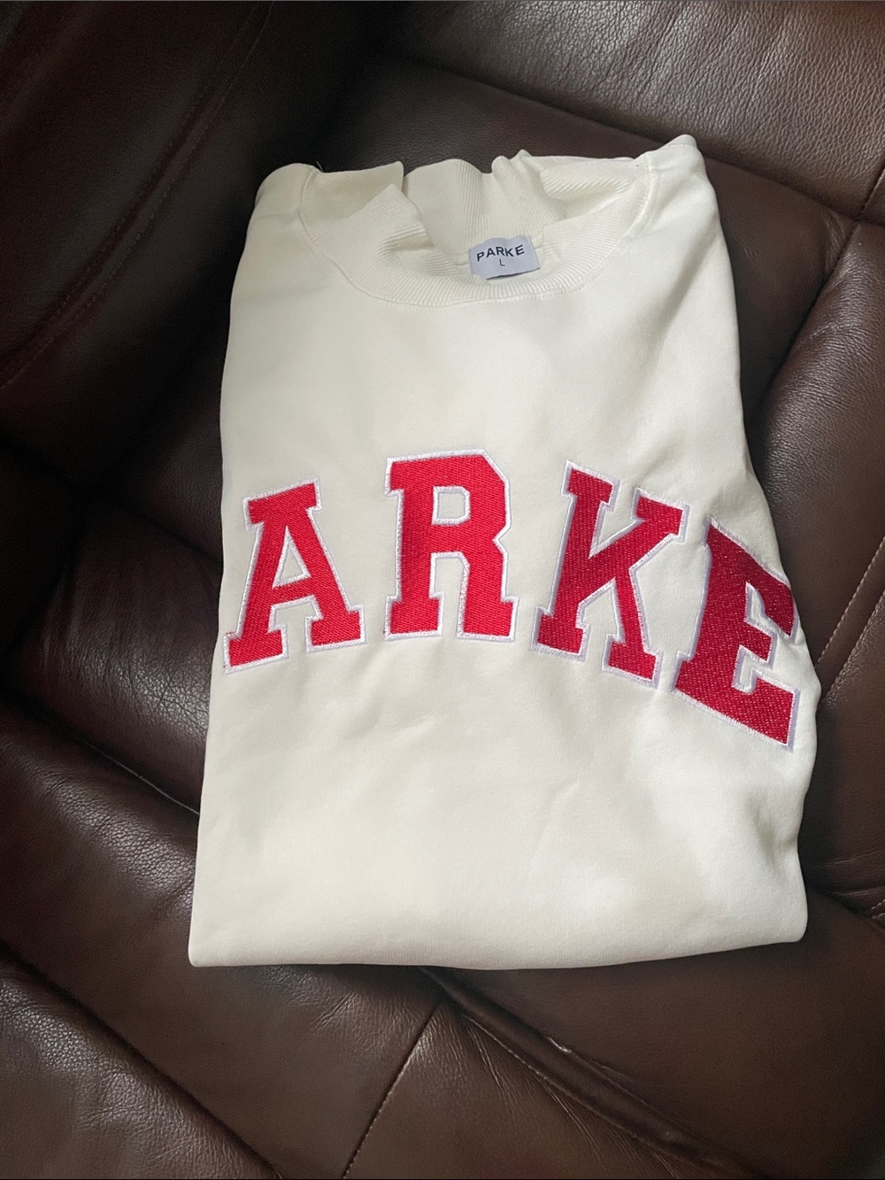 New cotton Sweatshirt white with Red Appliqué Logo size small